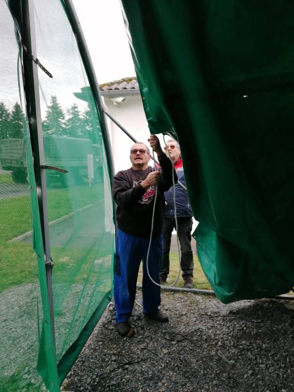 Installing the protective tarp