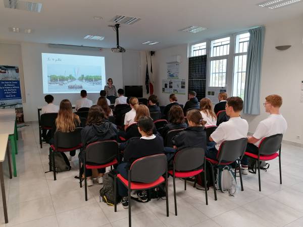 Marie presents the symbols of the Republic and the origin of the Marseillaise