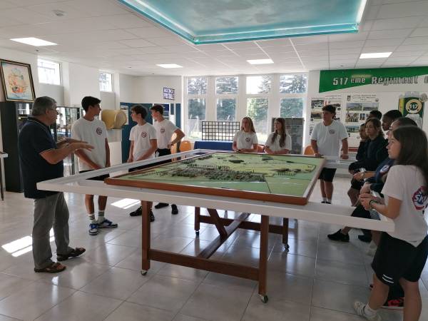 Dominique presenting the model of the La Martinerie base