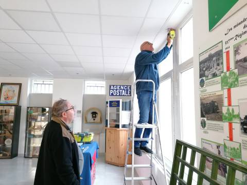 Installation of curtains in the army room