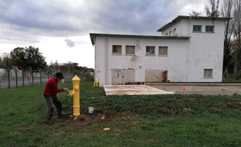 Painting an american fire hydrant