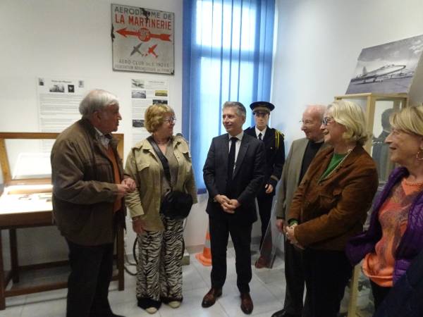 Elected officials discovering the display case