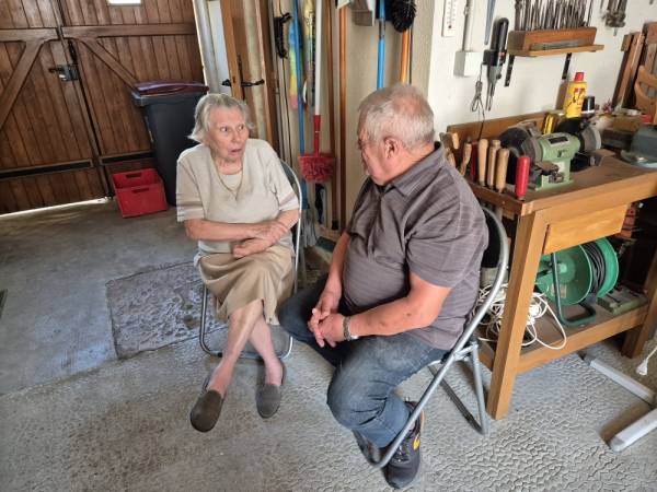 Jean-Pierre and Mauricette Petit deep in conversation